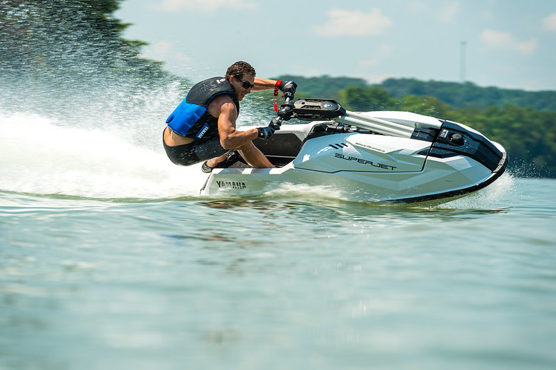 Men riding Yamaha Waverunner Superjet